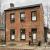 A Federal style house with early 20th century windows